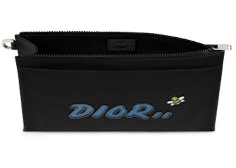 dior kaws pouch|DIOR x KAWS Black Nylon Pouch with Blue Dior logo.